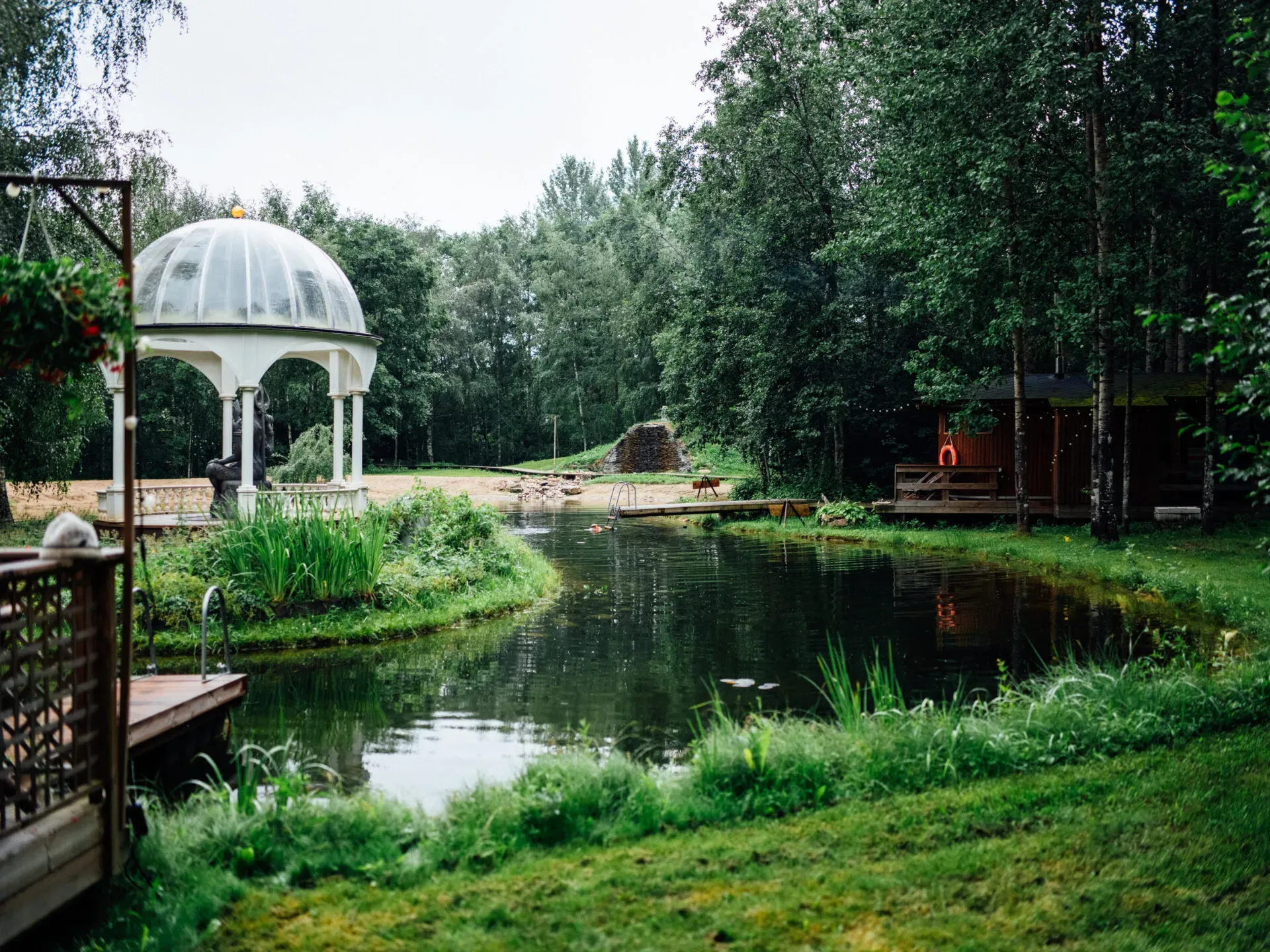 The swimming lake and pavilion at the venue