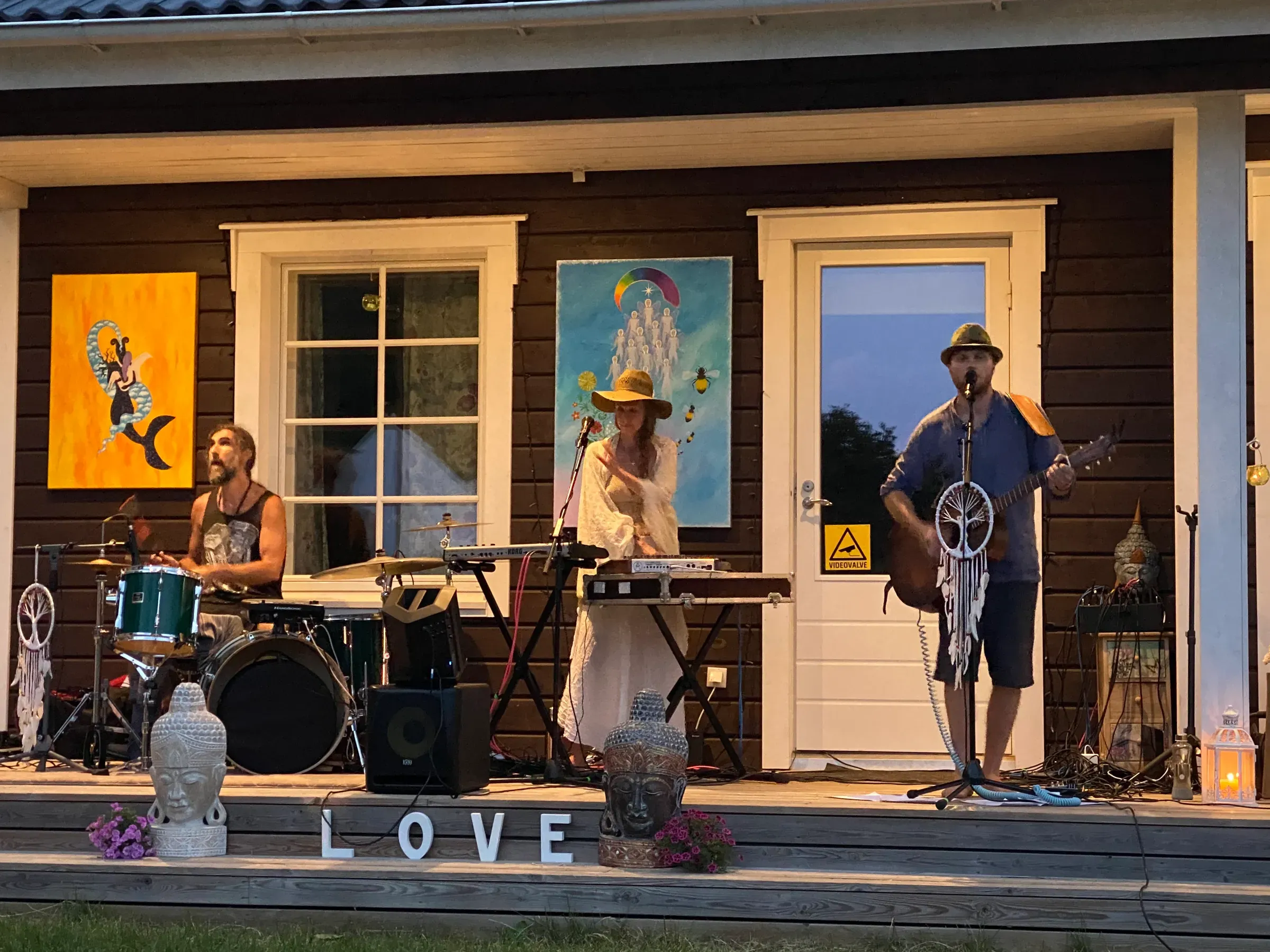 A live band playing at dusk