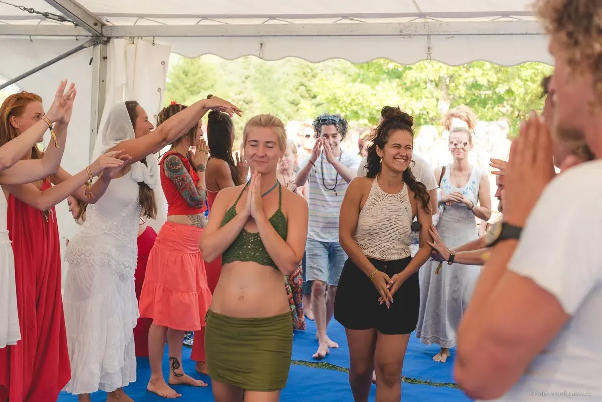 Participants embracing during a connection exercise